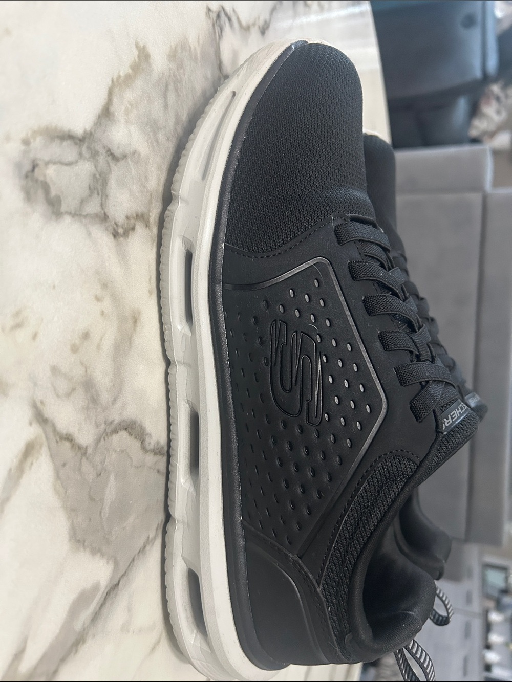Skechers Men's Black Slip-On Athletic Sneakers with White Midsole